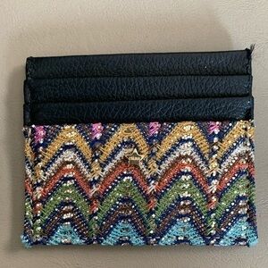 Mini sparkly wallet.
